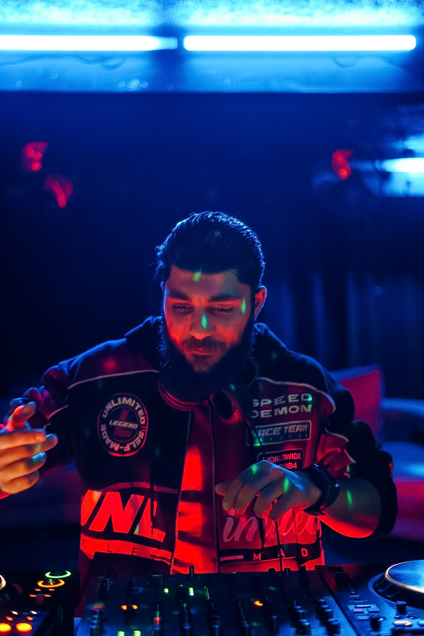 Light Musik performing in a blue-lit club